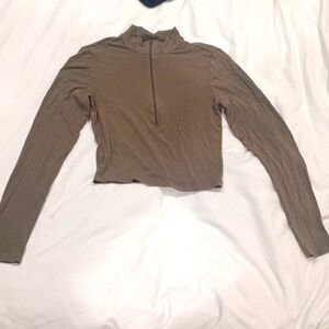 Olive green long sleeve zip up crop top